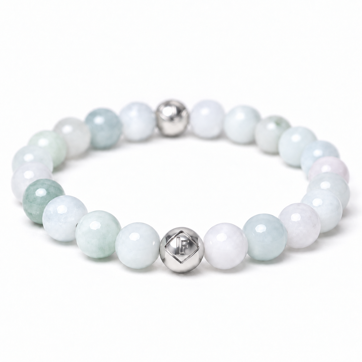 A beaded stretch bracelet featuring round light green, white, and pale blue gemstone beads, accented by two polished silver metal beads at the front and back, set against a clean white background.
