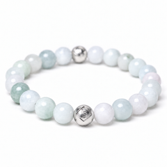 A beaded stretch bracelet featuring round light green, white, and pale blue gemstone beads, accented by two polished silver metal beads at the front and back, set against a clean white background.