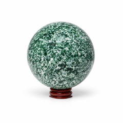 A polished green and white mottled stone sphere displayed on a small reddish-brown wooden stand against a clean white background.